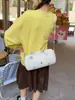 Bolso de nailon multicolor macarrón multifuncional nuevo transfronterizo 2026, ligero, moderno, versátil y se puede llevar como bolso de hombro, bolso cruzado o bolso de mano.