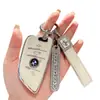 Estuche para llave BMW aplicable serie de cuchillas serie X35 serie X5 serie 3 X1 llavero para coche estuche juego ix3 hombres 320 mujeres carcasa