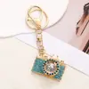 Estilo Coreano Criativo Chaveiro de Câmera com Strass e Diamante Chaveiro de Carro Moda de Luxo Leve Pingente para Bolsa Feminina