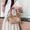 Bolso tote de alta gama vintage de bloques de color de nicho para mujer, nuevo modelo 2026, bolso tipo cubo simple y versátil, bolso de hombro, moderno