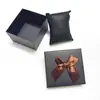 Caja Negra Serie Moño 8*9*5.3cm Caja para Relojes Caja de Joyería Caja para Empaque de Regalo