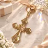 Llavero cruz creativo transfronterizo, aleación de zinc con cruz de pedrería, amuleto para llave de coche y bolso, regalo al por mayor
