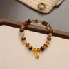 Pulsera de Piedra Ojo de Tigre Natural Color Tierra Maillard Pulsera de Otoño e Invierno Elástica Lujo Ligero Nicho Versátil Joyería para Mano Venta al por Mayor