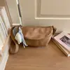 Bolsa transversal minimalista nicho retrô de bolinho, nova tendência moda outono de 2026 cor sólida bolsa de ombro para trabalho e deslocamento