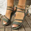 Sandalias planas de mujer talla grande para comercio exterior transfronterizo 2025, nuevo estilo de verano con tiras tejidas y bandas elásticas, sandalias de playa versátiles
