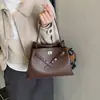 Diseño de Nicho Retro Simple Bolso Pequeño para Mujer 2025 Nuevo Bolso Cubo de Gran Capacidad para Mujer Estilo Extranjero Casual Bolso Cruzado