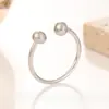 Popular Anillo de Acero Inoxidable con Alambre de Acero y Bolas de Acero de Amazon para Mujer, Diseño de Nicho Exagerado Único Versátil