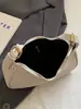 Bolso de moda tipo medialuna estilo coreano para mujer, nuevo bolso de mano casual de nicho primavera 2026, bolso de hombro de moda, bolso de axila para damas