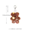 Punto Coreano Dongdaemun Otoño e Invierno Oso de Peluche Colgante de Bolso Lazo Muñeca de Dibujos Animados Muñeca Decorativa Venta al por Mayor