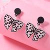 Novos brincos de design de amor com pontos de arco transfronteiriços, personalidade do Coringa, moda coreana, fábrica de atacado