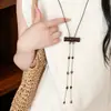 Nuevo collar largo degradado de estilo chino para mujer, lujo ligero vintage con un toque de alta gama, cadena para suéter de estilo étnico, accesorio de diseño nicho