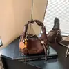 2026 Nuevo Estilo Coreano Moda Nicho Estilo Perezoso Bolso de Mano para Mujer Sensación de Alta Gama Versátil para el Día a Día Bolso de Hombro Bolso Cruzado