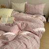 Um conjunto de quatro peças de lençóis jacquard tingidos com fios 2025, capa de edredom de algodão lavado na primavera, conjunto de três peças de roupa de cama Nantong