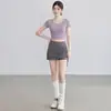 Hermoso Top de Yoga Espalda Descubierta para Mujer 2026 Nuevo Transpirable Ropa de Fitness Traje Deportivo de Pilates Manga Corta con Almohadillas en el Pecho