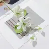 Flor doble de hilo tejido a mano Flor de Paulownia Ramo Flor de simulación Escena de flores Arreglo Decoración de flor artificial Vestidor del hogar Lindo cuatro