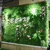 Pared de Plantas Artificiales Pared de Plantas Verdes Césped Superficial Decoración de Pared Interior Césped Verde Flores Falsas de Plástico Fondo de Imagen Pared