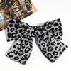Estilo europeu e americano moda personalidade nicho senso de design laço estampa de leopardo faixa de cabelo clipe de mola retro tudo combina anel de cabelo acessórios de cabelo