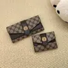Bolso de Mano Largo Transfronterizo Otoño e Invierno para Mujer 2025 Nueva Moda Portatarjetas con Múltiples Ranuras Billetera con Patrón Vintage Pinza para Billetes Versátil