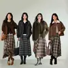 Falda Midi de Cuadros Irregulares Estilo A 2026 Nuevo Estilo Otoño Falda Midi para Mujer Cintura Alta Adelgazante Temperamento Versátil Longitud Media