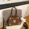 2026 Nuevo Bolso de Mano Retro de Gama Alta Bordado de Gamuza Bolso de Hombro Único Moda para Viajes Cotidianos Bolso de Axila