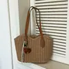 Bolso de paja con borlas transfronterizo, nuevo bolso tejido de paja, bolso de playa para vacaciones, bolso de hombro versátil, bolso tote de verano para el día a día