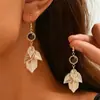 Ez5866 Lujo Ligero Estéreo Hoja Metal Perforado Creativo Nuevos Pendientes para Mujer Cara Larga Adelgazantes Joyería para Niñas