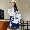 Mochila 2024 nova mochila escolar para estudante do ensino fundamental estilo coreano moda cor contrastante mochila grande capacidade marca de moda bolsa comércio exterior