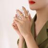 Japón y Corea del Sur Pequeño Fresco Transfronterizo Más Vendido Geométrico Pareja Liso Anillo de Acero de Titanio Par de Anillos Moderno Simple Verano Nuevo Anillo