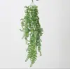 Plantas verdes artificiais, samambaias de parede penduradas, flores falsas de plástico, decorações de parede de trepadeiras para uso interno e externo, atacado do fabricante