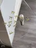 Arte de Unha Laço Joia de Liga Tridimensional Luxo Leve Dourado e Prateado Borboleta Oca Rebite Diamante de Unha Decoração Atacado