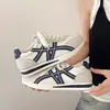 Zapatillas de entrenamiento alemanas súper modernas, casuales, de suela gruesa, para mujer, nueva colección otoño 2026, zapatillas rojas de suela blanda, hacen que tus pies se vean más pequeños, zapatillas blancas