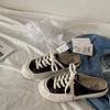 Zapatos de lona de media caña para mujer 2022 verano delgados para mujer ulzzang versátiles retro estilo Hong Kong zapatos de skate