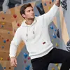 Sudadera con capucha para hombre transfronteriza, Amazon primavera/otoño jacquard texturizado de manga larga con bolsillo canguro etiqueta de cuero cordón sudadera casual