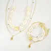 Cadena de Clavícula Bohemia Transfronteriza Accesorios Multicapa Collar con Colgante de Playa para Mujer Conjunto de Pulsera y Collar de Concha y Cuentas de Arroz