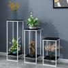 Estante de flores de hierro forjado de estilo nórdico, estante decorativo, estante para macetas carnosas laureadas verdes, estante para flores de almacenamiento multicapa para sala de estar en interiores.