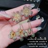 Pendientes de cristal amarillo huevo chapados en oro de 18 quilates con ocho corazones y ocho flechas, pendientes de flor de circón con diamantes.