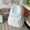 Mochila transfronteriza para niñas, estilo japonés, nuevo diseño moderno, alto atractivo estético, estilo universitario, estampado de estrellas, mochila ligera para estudiantes de secundaria