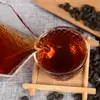 Té glutinoso fragante Pu'er de árbol antiguo té fósil plata rota 500g arroz glutinoso fragante té cocido cabeza de té viejo