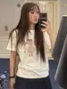 Em estoque e envia imediatamente, sem devoluções ou trocas por problemas de não qualidadeColeção de verão em liquidação de Dongdaemun, Coreia, de blusas de manga curta
