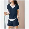 Direto da Fábrica Tricô Waffle Novo Conjunto Esportivo Conjunto de Camiseta e Shorts para Mulheres Verão Manga Curta Conjunto de Duas Peças