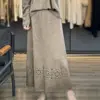 Falda Larga de Lana de Cintura Alta Tejida a Crochet para Mujer, Nueva Falda de Invierno 2026 Estilo Coreano Hueca con Dobladillo Ancho, Falda de Paraguas Fluida