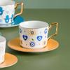 Estación independiente etiquetado transfronterizo en nombre de la taza de café de cerámica de moda ojo del diablo taza de café tendencia europea juego de platillo
