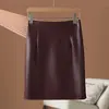 Nova Saia de Couro Haining Outono/Inverno 2026 para Mulheres, Saia Lápis de Pele de Ovelha Emagrecedora de Cintura Alta, Meia Saia Elegante e Sexy