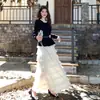 Elegante Conjunto de Vestido Estilo Francês para Mulheres 2025 Outono e Inverno Novo Conjunto de Duas Peças com Top e Saia de Camadas Super Feérico