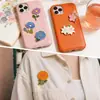 Venta al por mayor del fabricante Insignias Esmaltadas Coloridas de Plantas y Flores Colores Dopamina Macarrón Pegatinas Versátiles para Teléfono Personalización