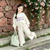 Conjunto de Moda Ins para Niñas con Lazo 2026 Primavera y Otoño Sudadera de Moda y Pantalones de Pierna Ancha Estilo Coreano Conjunto de Dos Piezas