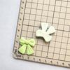 Pajarita de crema para el cabello, accesorio para el cabello, parche hecho a mano, colgante casero, accesorios de resina.