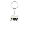 Serie de Notas Musicales Más Vendida Transfronteriza Accesorios para Llaves Hebilla de Forma Creativa Pegamento Suave de PVC Colgante Creativo para Mochila Colgador de Llaves