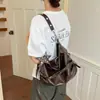 Bolso de axila de nicho coreano para mujer, nuevo bolso tote de moda retro de tendencia 2026, bolso de motociclista de alta gama de gran capacidad