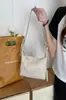 2026 Novo Estilo Garota Cool Design de Nicho Bolsa de Ombro com Zíper de Couro Bolsa de Braço Bolsa Retrô Europeia e Americana